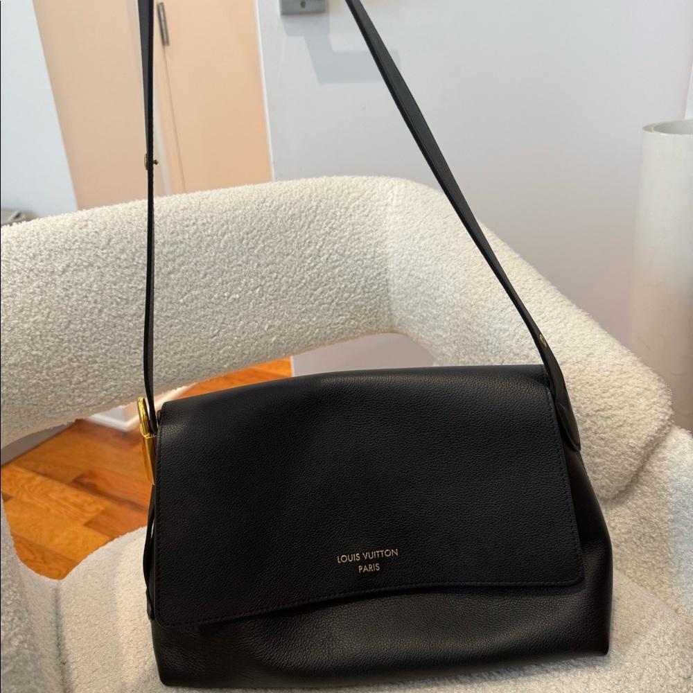 NEVER USED Louis Vuitton black messenger bag 2026